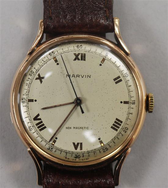 A gentlemans 18ct gold Marvin non magnetic manual wind wrist watch.